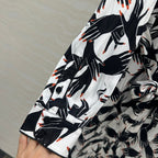 DVF WHITE AND BLACK PRINTED SILK SHIRT DRESS