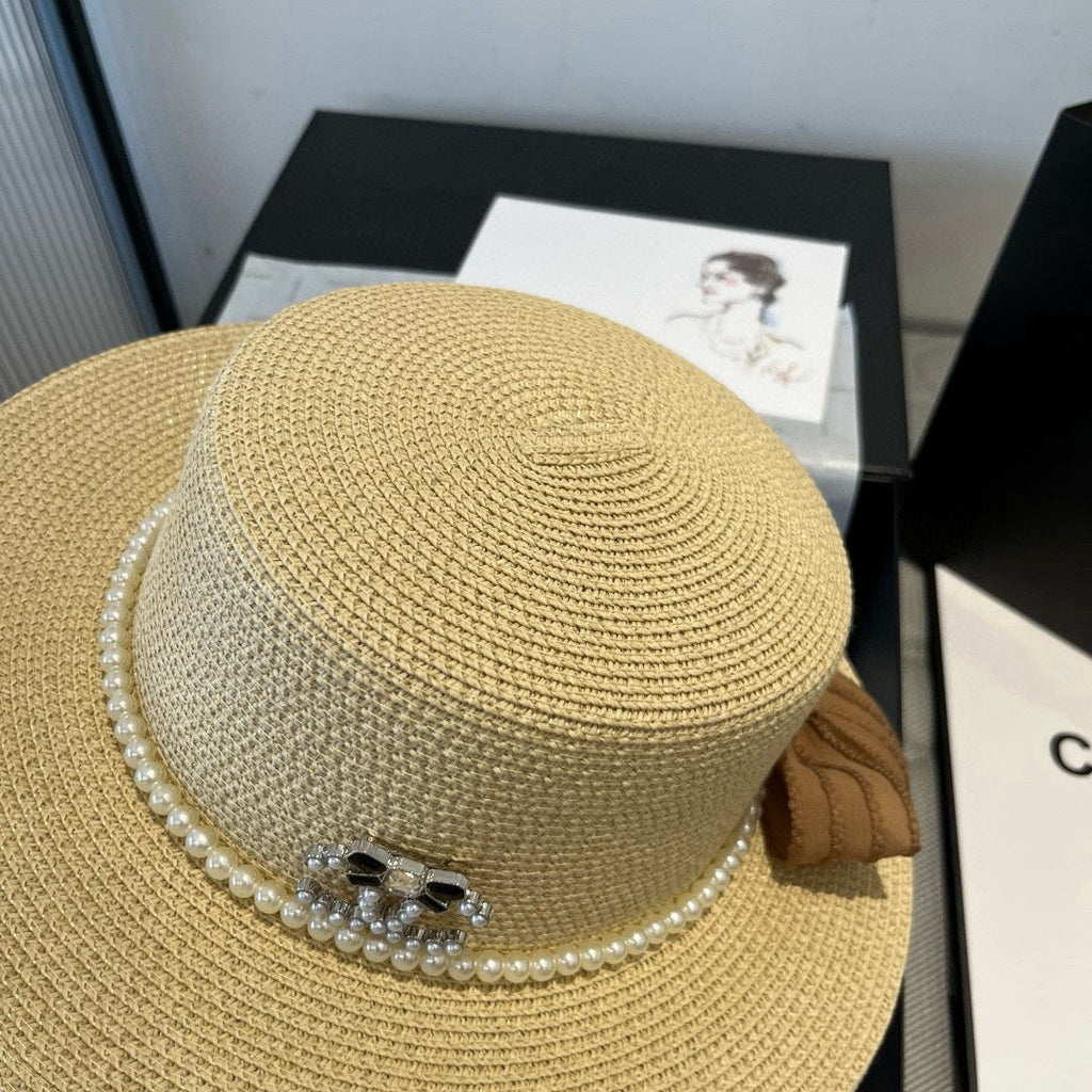 FLAT STRAW HAT WITH BOW BROWN 673922