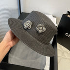 FLAT STRAW HAT BLACK FLOWER ATTACHMENT 673929