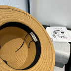 FLAT STRAW HAT BROWN FLOWER ATTACHMENT 673930