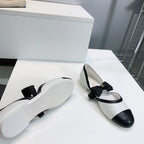 CHANEL FLAT MARY JANE SHOES 25S IN WHITE MIX BLACK LAMBSKIN EMBOSSED LOGO WITH BOW