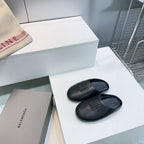 BALENCIAGA 25S MULES IN BLACK LAMBSKIN