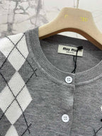 MIUMIU CARDIGAN STYLE 226