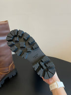 PRADA 25S HIGH-CUT PLATFORM BOOTS IN BROWN CALFSKIN WITH GOLD HARDWARE