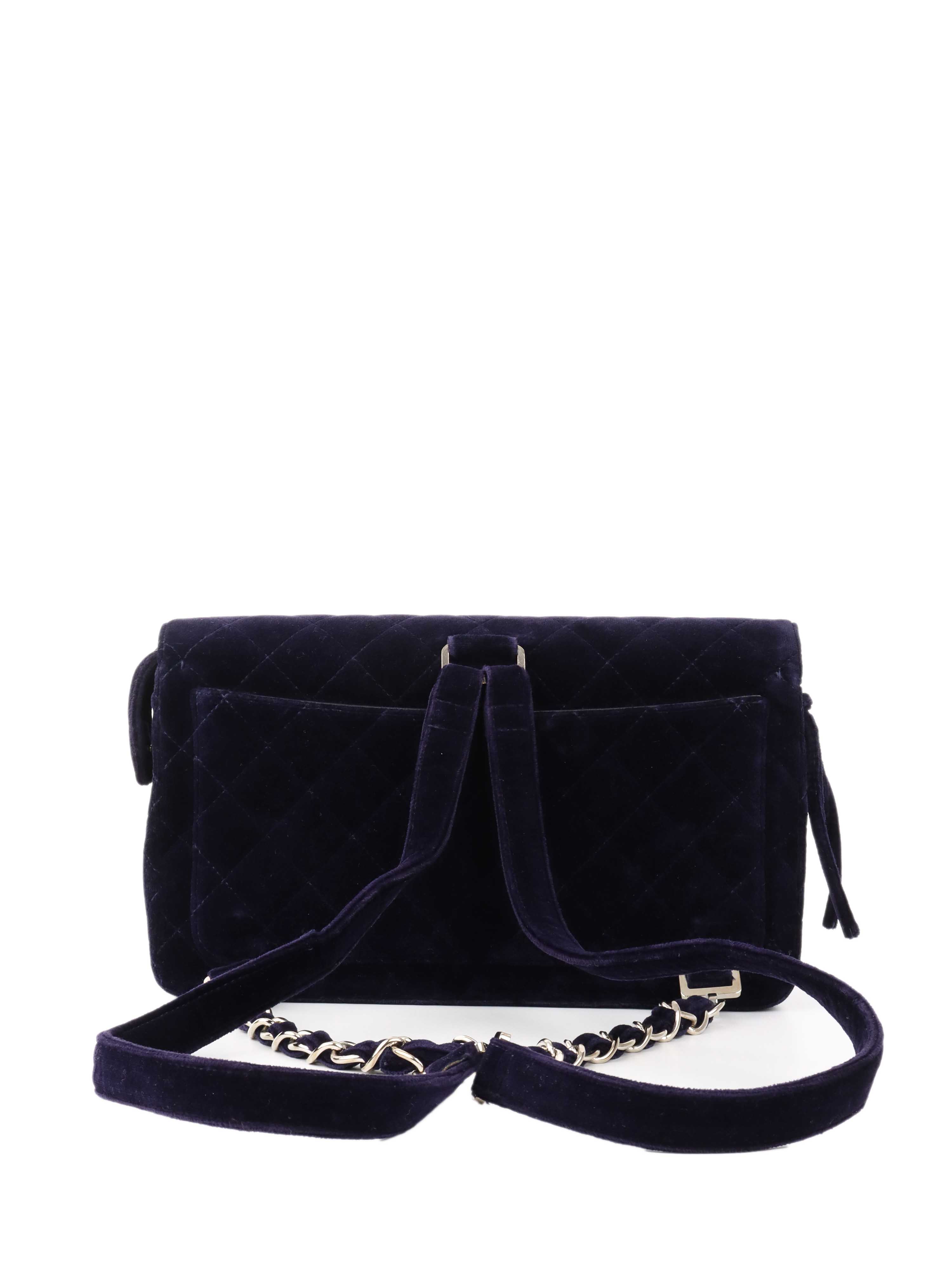 CHNL -   Navy Velvet Classic Flap Backpack.
