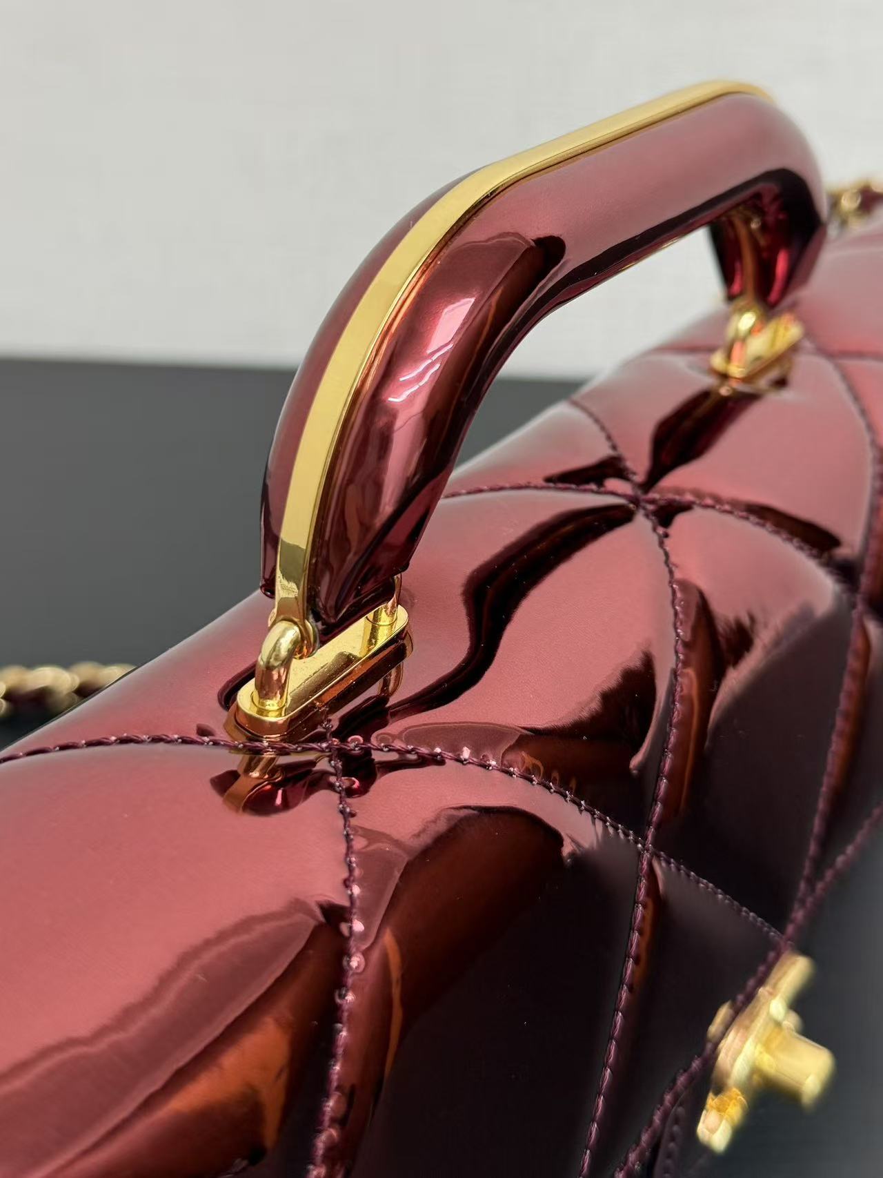 CC Large Flap Bag With Top Handle Burgundy Metallic Calfskin GHW