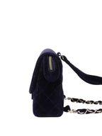 CHNL -   Navy Velvet Classic Flap Backpack.