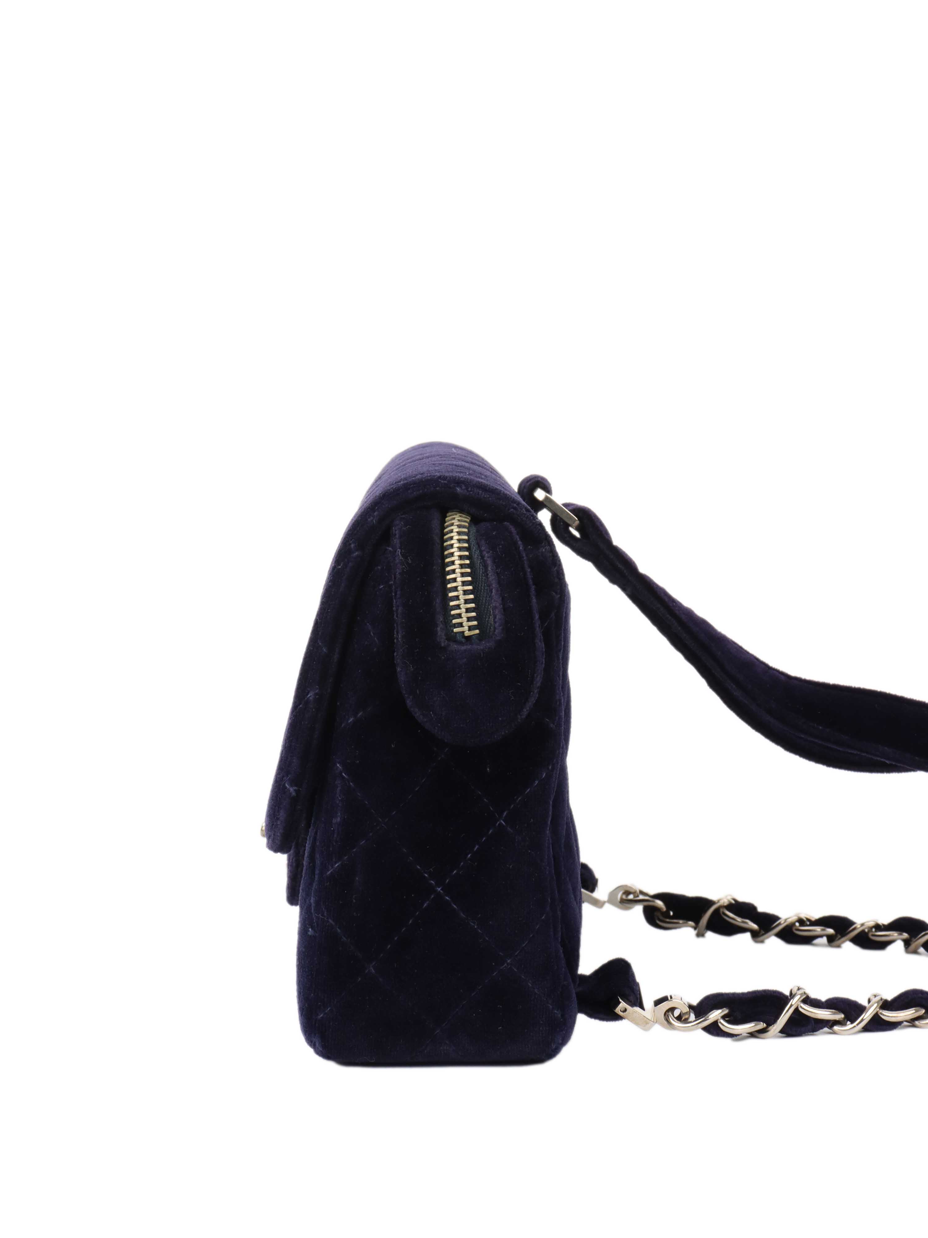 CHNL -   Navy Velvet Classic Flap Backpack.