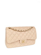 CHNL -  Beige Lambskin Jumbo Classic Flap GHW