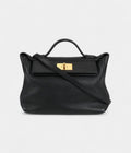 HM24/24 Handmade in Black and Gold-Tone Leather with Palladium Hardware