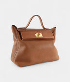 HM24/24 Handmade in Gold Leather with Palladium Hardware