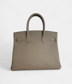 HM BK 30 Beige Leather Handbag A Timeless Icon of Luxury