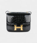 HMConstance 18 Noir / Black Alligator Gold Hardware