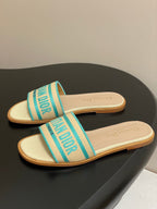 DWAY SLIDES IN BEIGE TURQUOISE CANVAS
