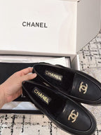 SLINGBACK LOAFER IN BLACK CALFSKIN AND SHEARLING