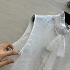 SLEEVELESS BLO IN WHITE LINEN LACE TRIM AND NECK TIE