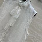 SLEEVELESS BLO IN WHITE LINEN LACE TRIM AND NECK TIE