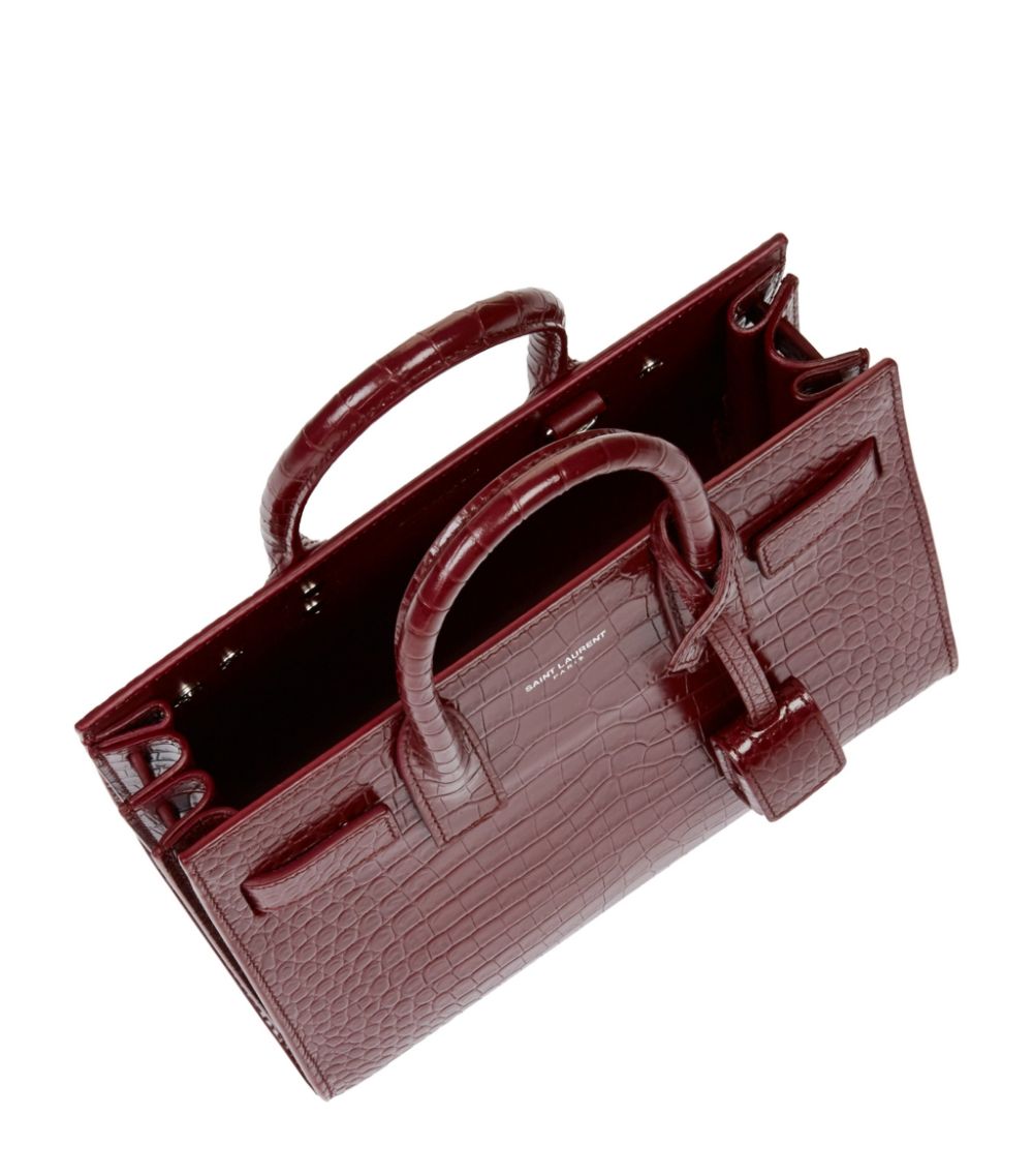 YLS SAC DE JOUR BABY IN EMBOSSED CROCODILE SHINY LEATHER
