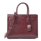 YLS SAC DE JOUR BABY IN EMBOSSED CROCODILE SHINY LEATHER
