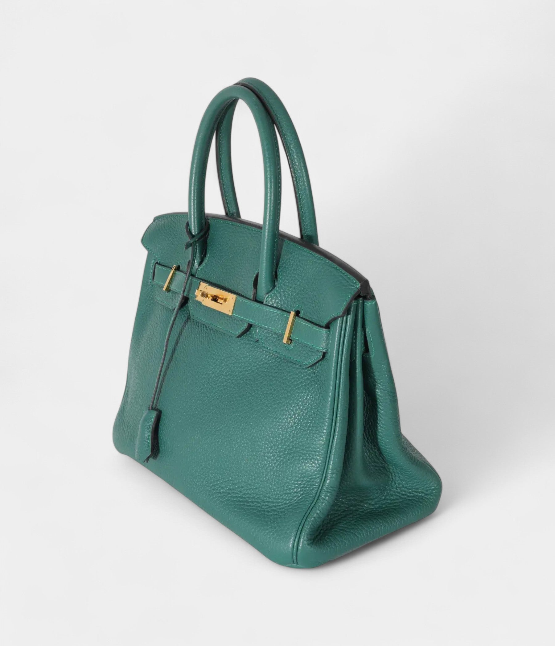 The  HM BK 30 Green Leather Handbag is a timeless symbol of luxury