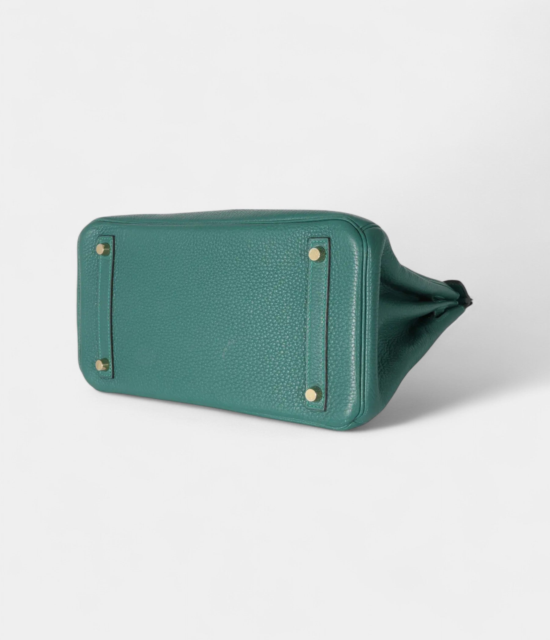 The  HM BK 30 Green Leather Handbag is a timeless symbol of luxury