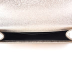 YLS METALLIC CALFSKIN MONOGRAM CASSANDRE CLUTCH