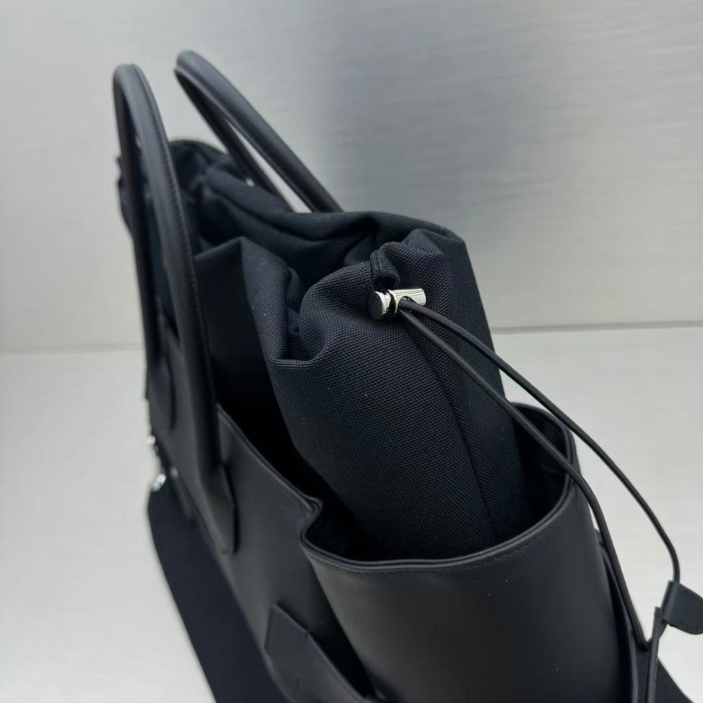 The Row Margaux 17 Inside Out Black Canvas & Leather
