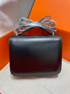 CONSTANCE CLOUTÉ BLACK BOX 24 IN BLACK CALFSKIN PALLADIUM HARDWARE