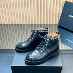 CHANEL 25S MARTIN LACE-UP BOOTS WITH CHAIN DETAIL IN BLACK CALFSKIN