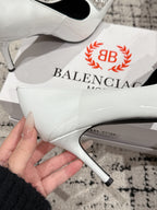 POINTED HIGH PUMPS IN WHITE PATENT CALFSKIN WITH CRYSTAL BUCKLE