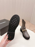 CHANEL ANKLE BOOTS 25S IN SMOKY GREY LAMBSKIN EMBOSSED LOGO WITH GOLD HARDWARE