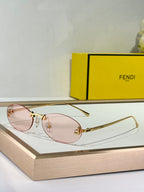 FIRST CRYSTAL RIMLESS OVAL FRAME SUNGLASSES FE4075US IN METAL