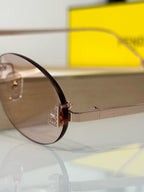 FIRST CRYSTAL RIMLESS OVAL FRAME SUNGLASSES FE4075US IN METAL