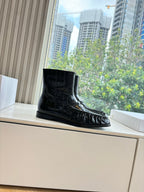 YSL 25S ANKLE FLAT BOOTS IN BLACK EMBOSSED LAMBSKIN WITH SIDE ZIPPER