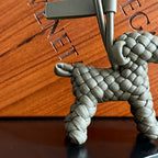 BOTTEGA VENETA 25S DOG CHARM IN GREIGE CALFSKIN