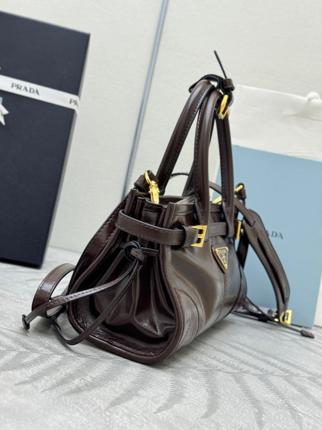 PRADA 25S BONNIE MINI HANDBAG 23 IN DARK BROWN CALFSKIN GOLD HARDWRE