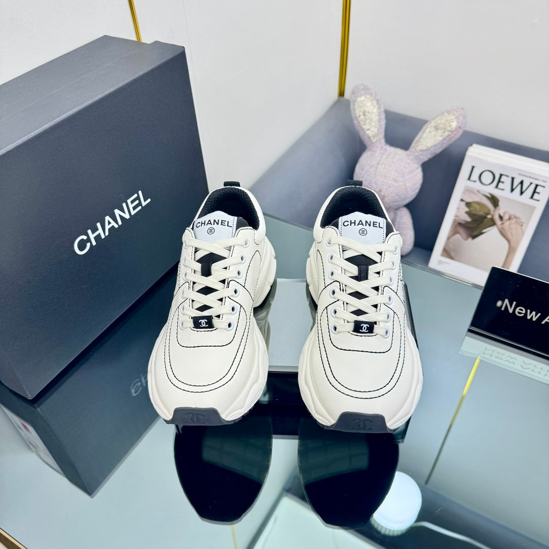 TRAINERS SNEAKER IN WHITE CALFSKIN WITH BLACK EMBROIDERED
