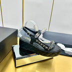 CC WEDGE SANDALS 25S IN BLACK CALFSKIN WITH GOLD HARDWARE