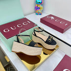 GG HIGH WEDGE SANDALS IN BLACK FABRIC AND RAFFIA WITH GOLD HARDWARE