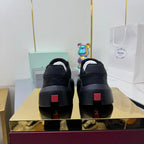 PRADA 25S CROSS LACED SNEAKERS IN BLACK CALFSKIN