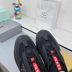 PRADA 25S CROSS LACED SNEAKERS IN BLACK CALFSKIN