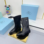 PRADA 25S BROOKLYN BOOTS 50MM IN BLACK CALFSKIN WITH LOGO