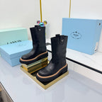 PRADA 25S HIGH MARTIN BOOTS 50MM IN BLACK CALFSKIN