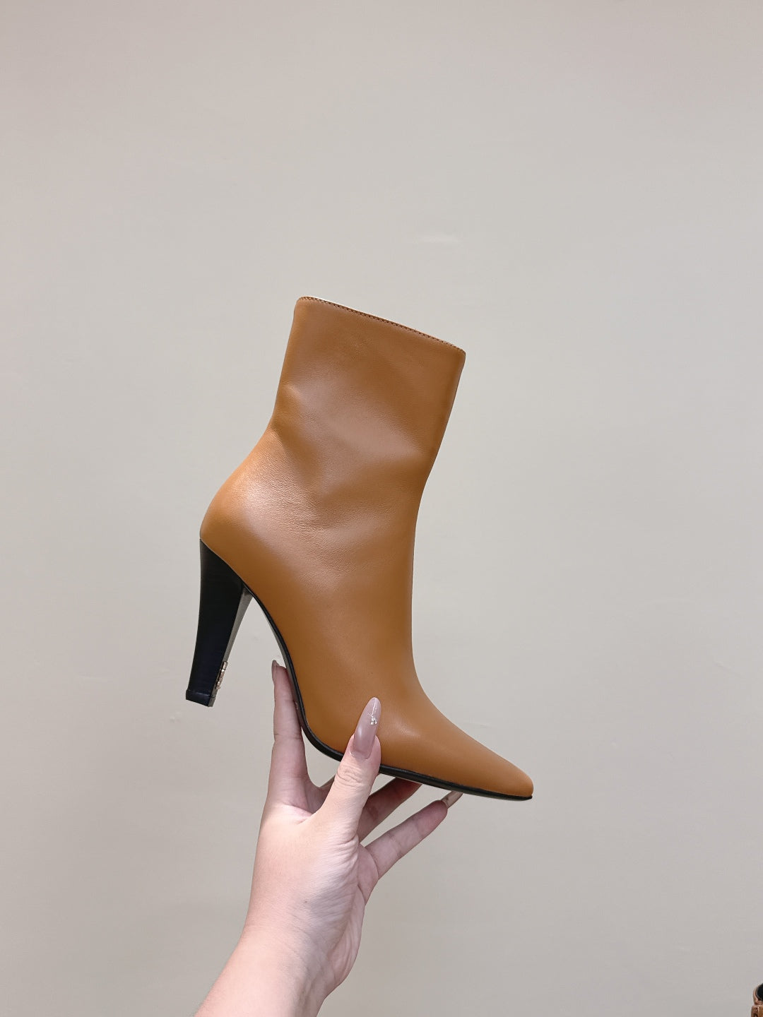 YSL 25S HEELED ANKLE BOOTS 75 MM IN BURNT ORANGE LAMBSKIN
