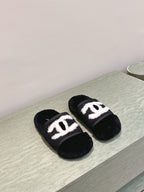 CHANEL 25S FUR SLIPPERS DOUBLE-LAYERED IN BLACK WITH WHITE CC LOGO