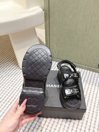 CHANEL 25S SANDALS IN BLACK PATENT CALFSKIN GOLD HARDWARE
