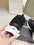 CHANEL 25S LUXURY SNEAKERS IN BLACK CALFSKIN AND SUEDE
