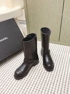 CHANEL 25S CALF-HIGH CHELSEA BOOTS IN BLACK CALFSKIN GOLD HARDWARE