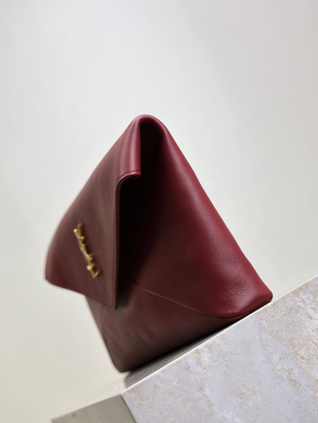 YSL 25S CASSANDRE LARGE ENVELOPE POUCH 29 IN DARK RUBY SHINY CALFSKIN GOLD HARDWARE