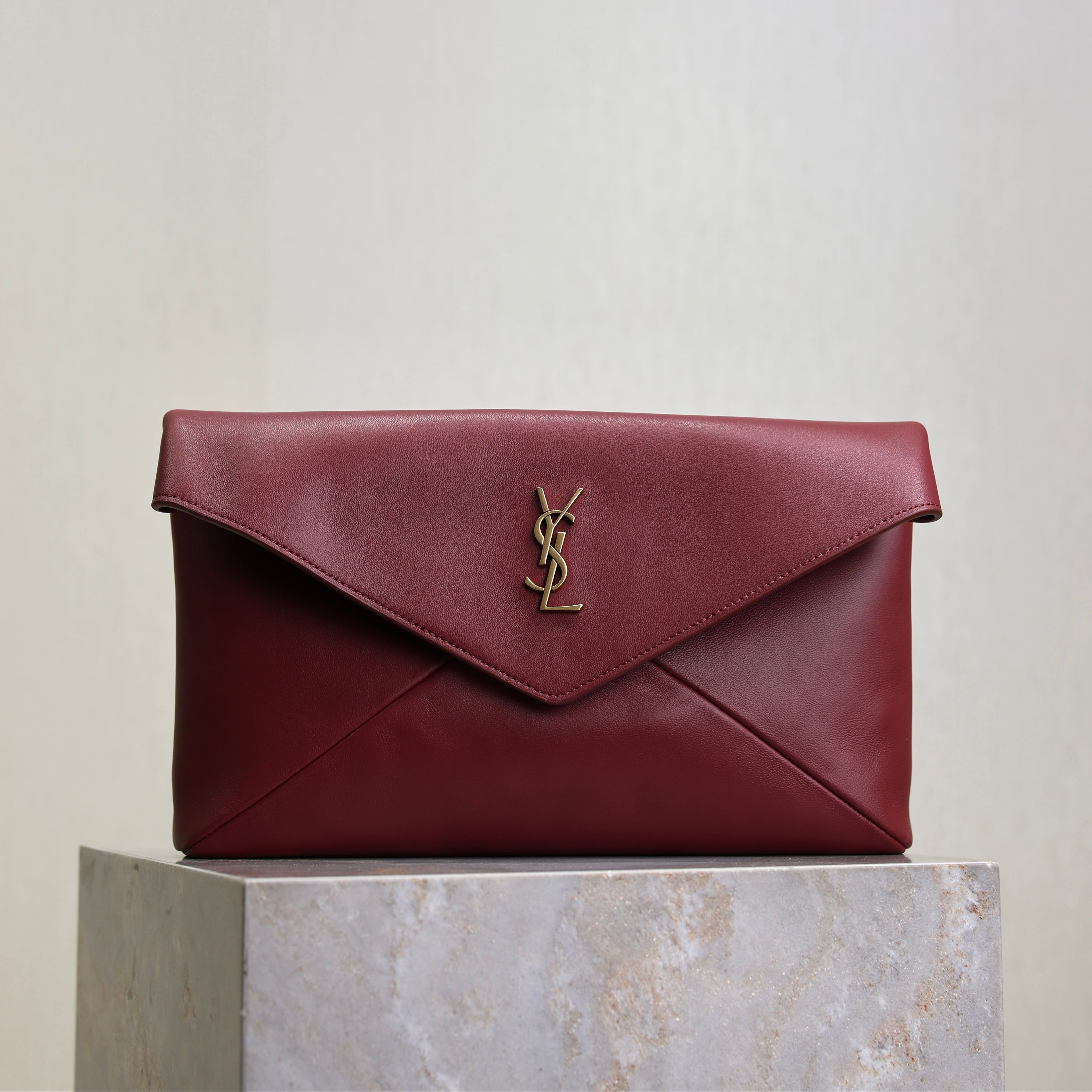 YSL 25S CASSANDRE LARGE ENVELOPE POUCH 29 IN DARK RUBY SHINY CALFSKIN GOLD HARDWARE